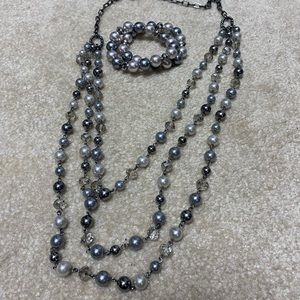 Layered pearl necklace and bracelet